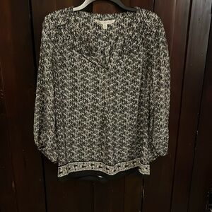 Black and white patterned blouse